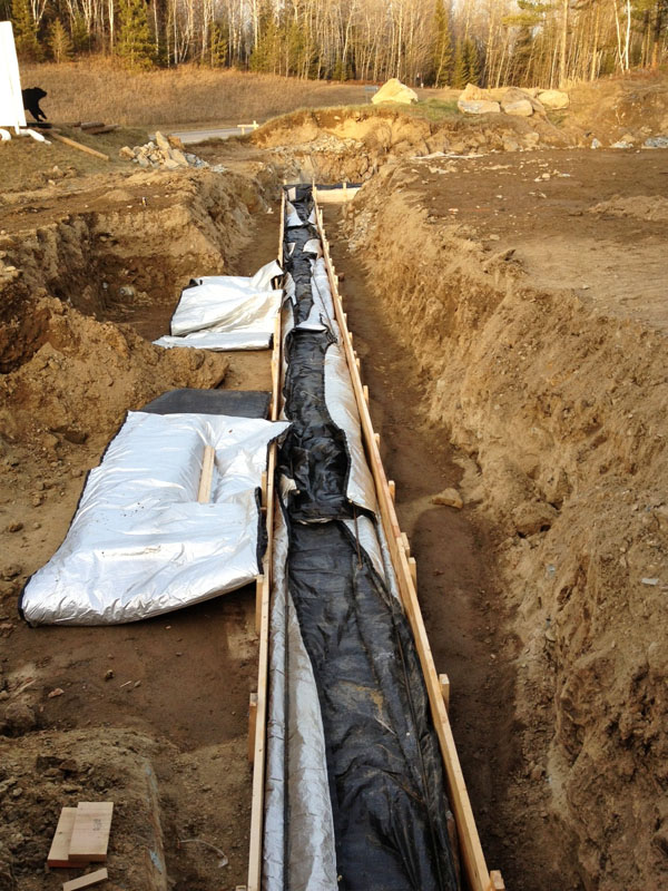 Blanketed foundation forms await cement - Nov 16, 2012  