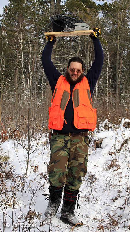 Ted carries equipment