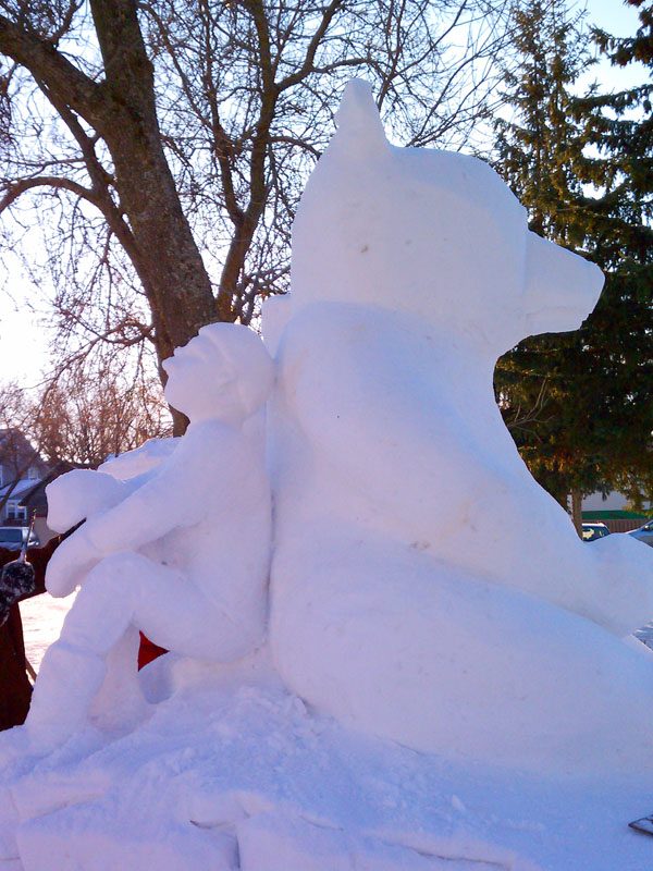 man and bear snow sculpture - Feb 4, 2012