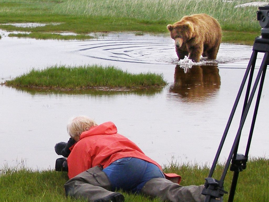 Lynn with Grizzly making ripples in Alaska