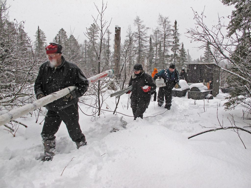 Carrying cameras to den site - 2010