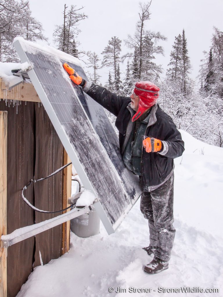 Lynn cleaning solar panels - 2010
