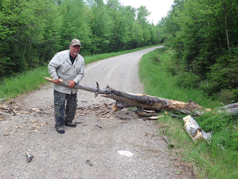 Mike clears the road