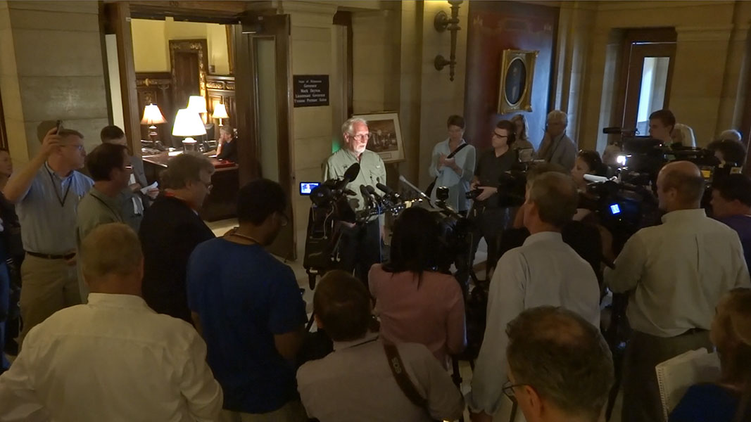 Lynn speaks to reporters after meeting