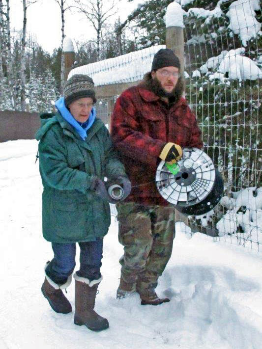 Judy and Ted installing den cam