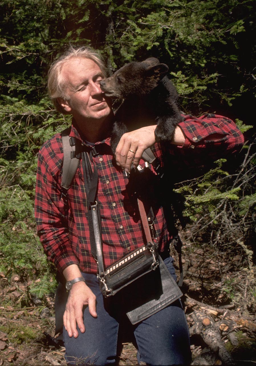 Dr. Rogers with computer and cub