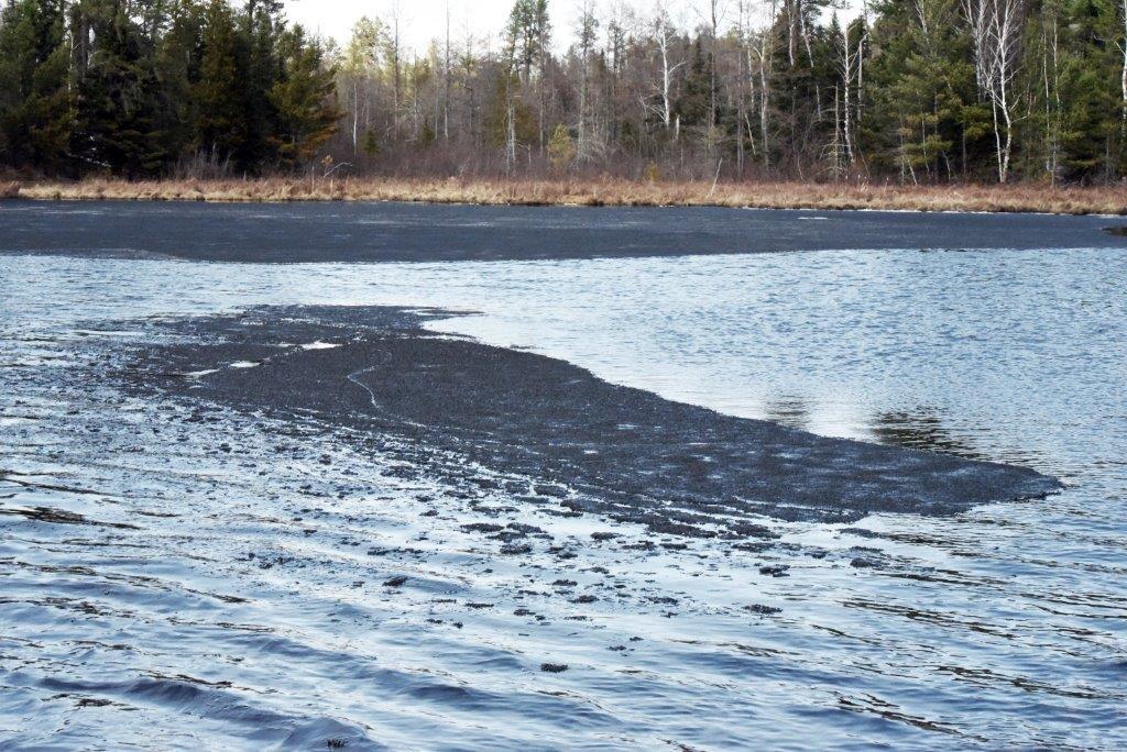 Black ice blowing by